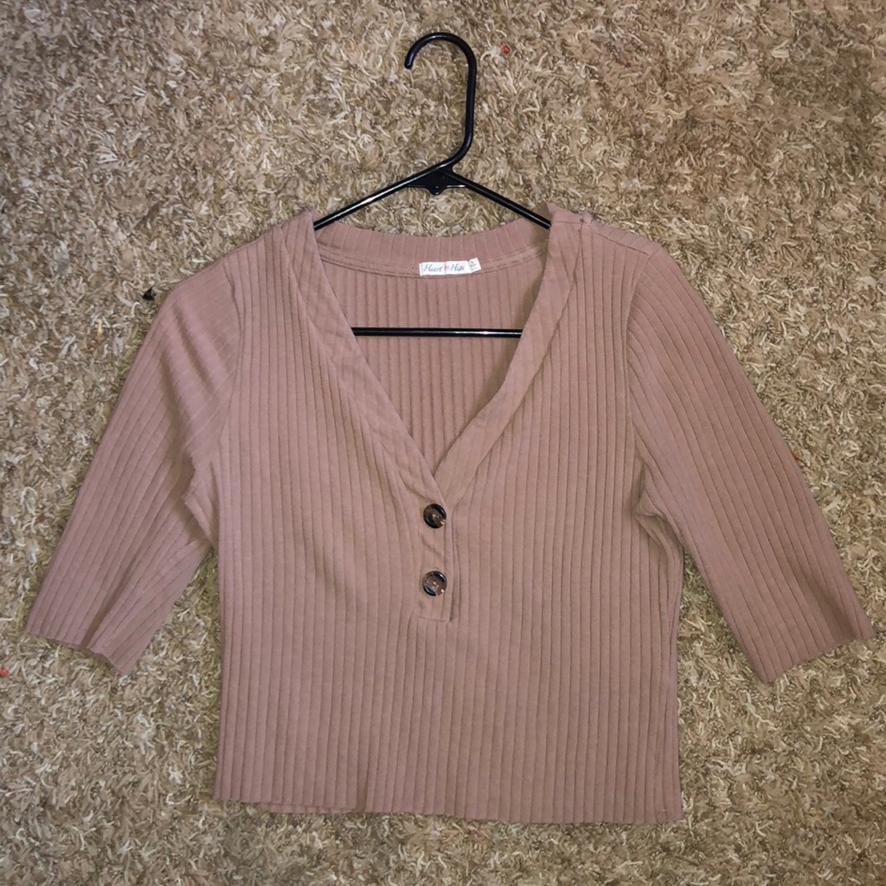 Beige colored button top